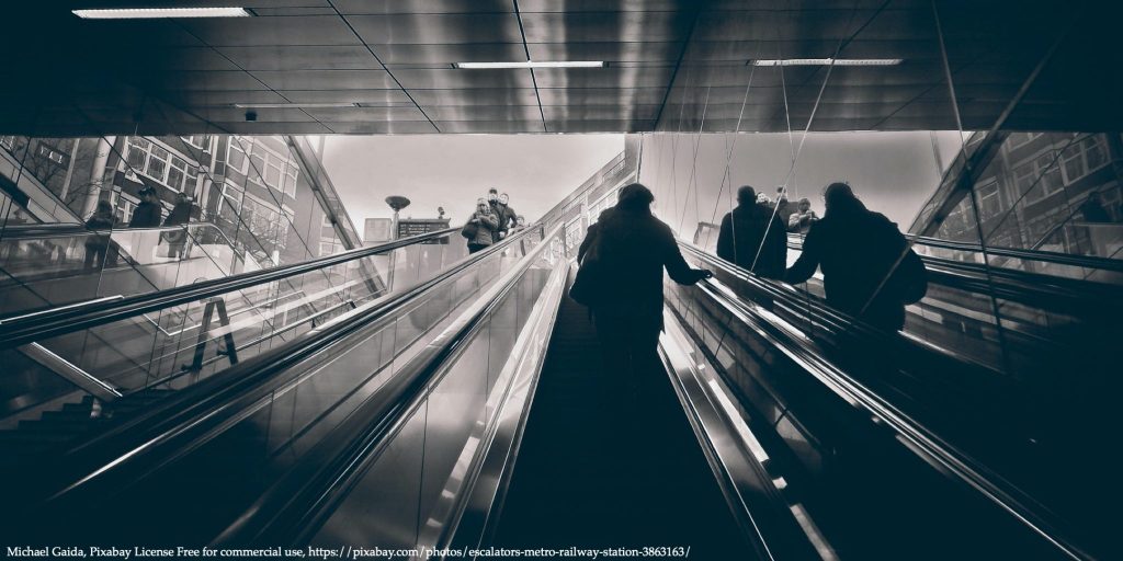 Image of a metro elevator going upwards representing shadow economy of Russia