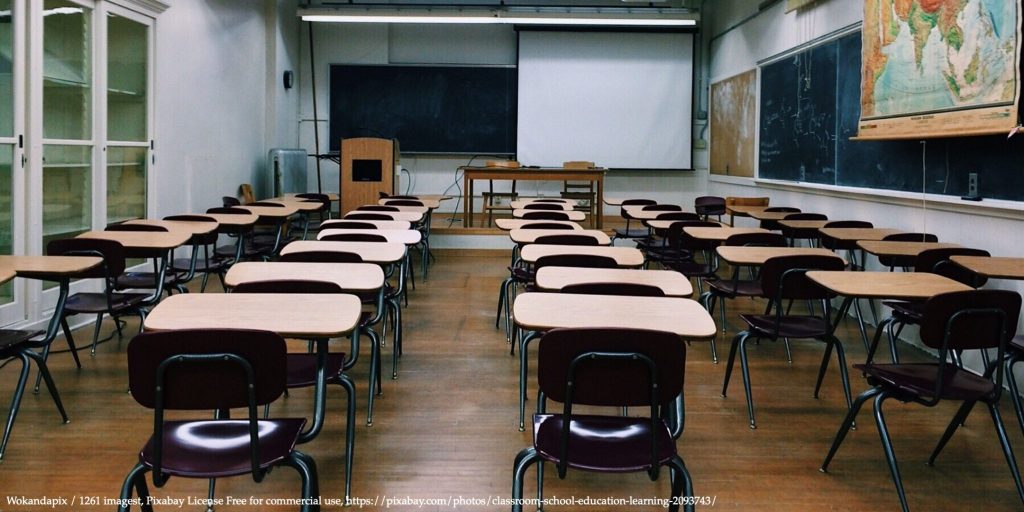 Image of an empty classroom representing distance learning environment during the COVID-19 outbreak