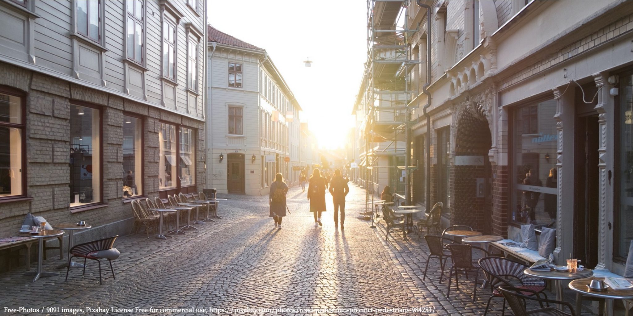 Image of sunrise in Stockholm street representing Sweden's different approach to COVID-19 response