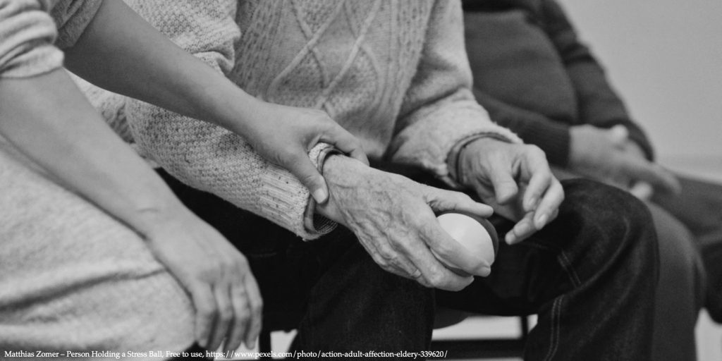 Image of different age people holding hands representing older people in Poland and COVID19