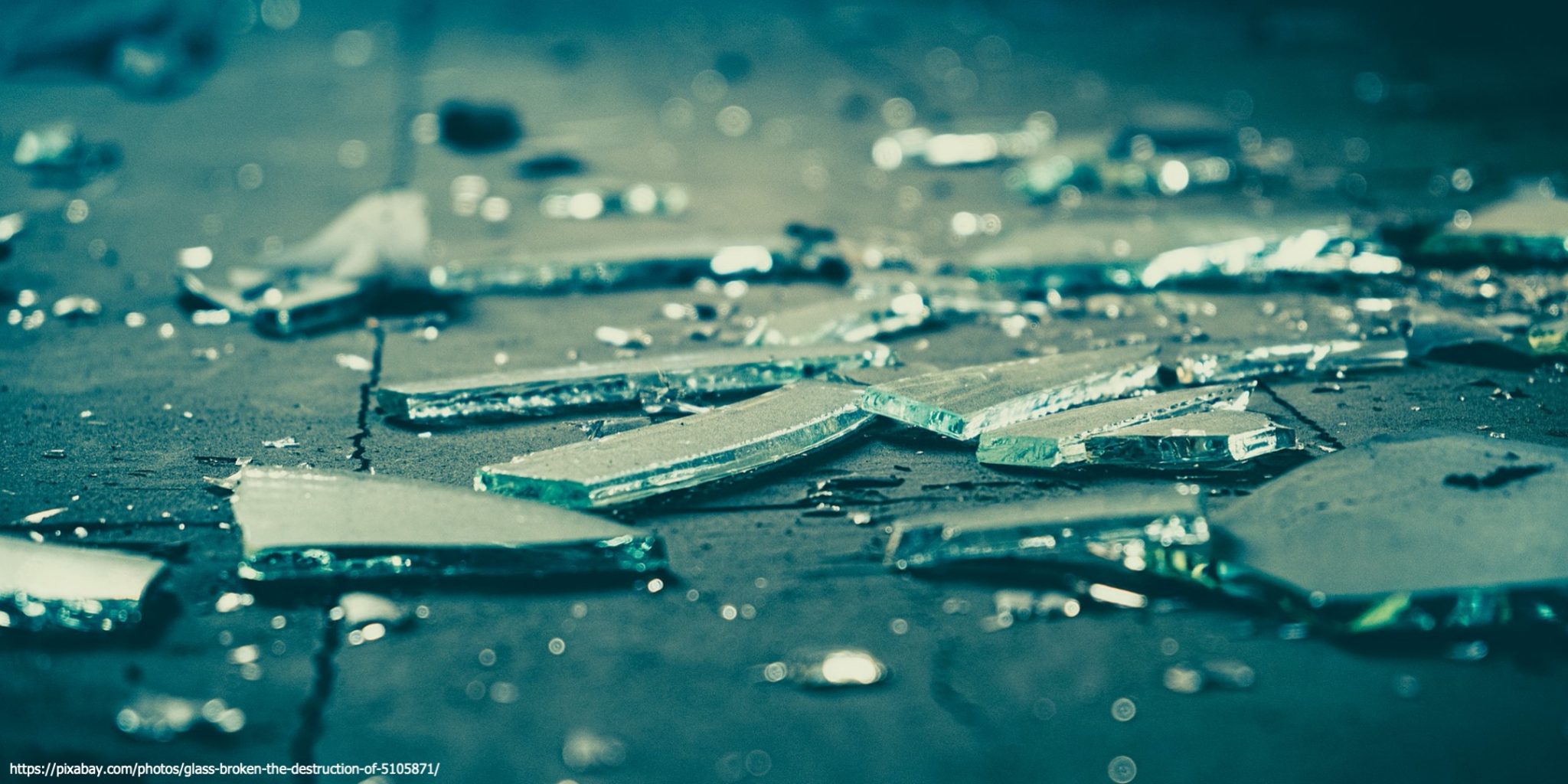 An image of broken glass representing perspectives of domestic violence