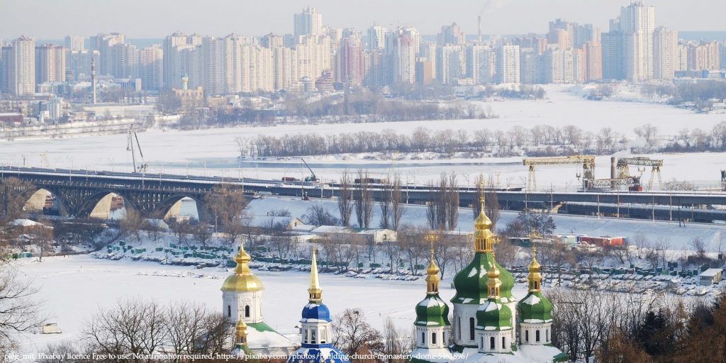 Kiev in snow during. the winter with condominiums under heating