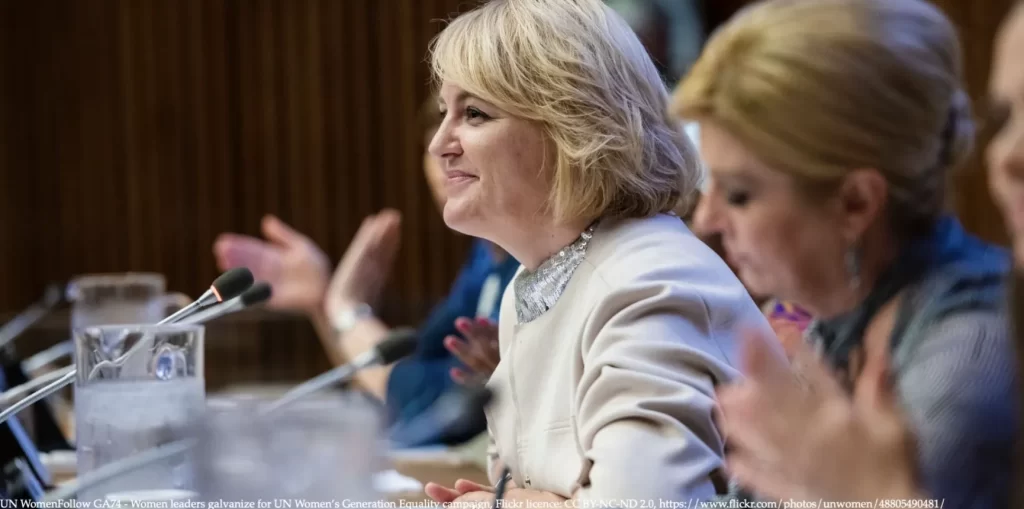 Women leaders at UN discussing political representation and gender equality representing women in politics.