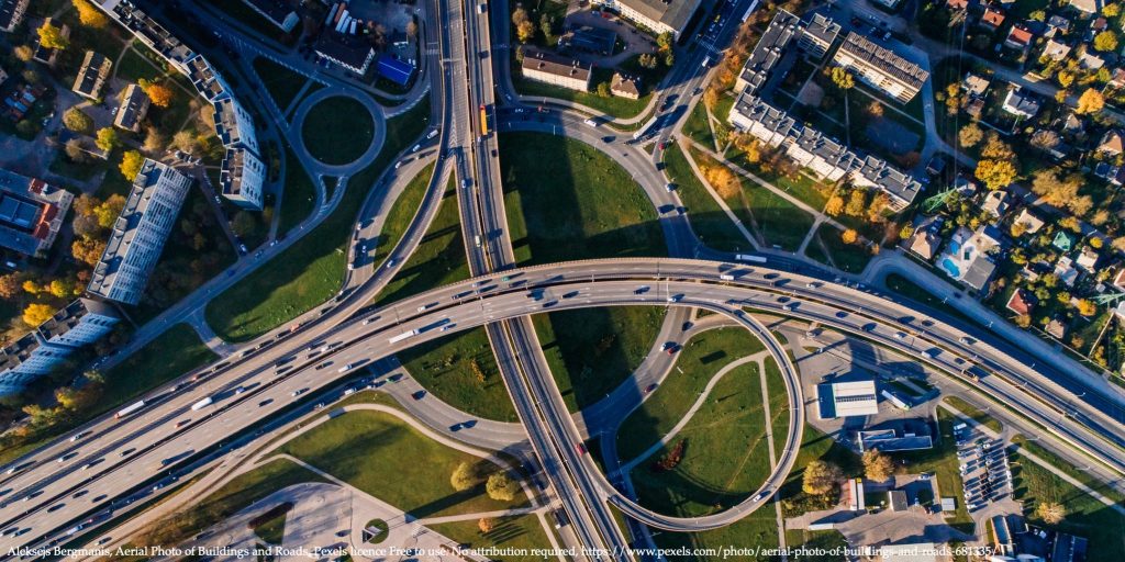 Aerial photo of buildings and roads representing infrastructure investments