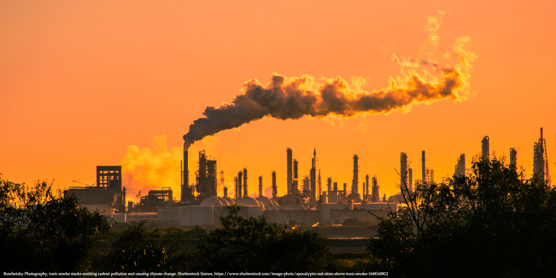 Toxic smoke stacks emitting carbon pollution and causing climate change and representing climate risk perception