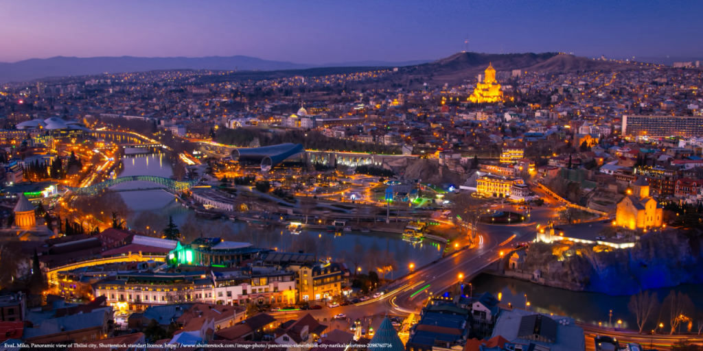 Image of Tbilisi at night representing risks of Russian business ownership in Georgia